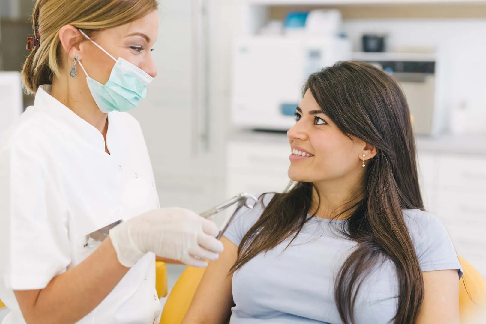 Tooth extraction performed by an oral surgeon